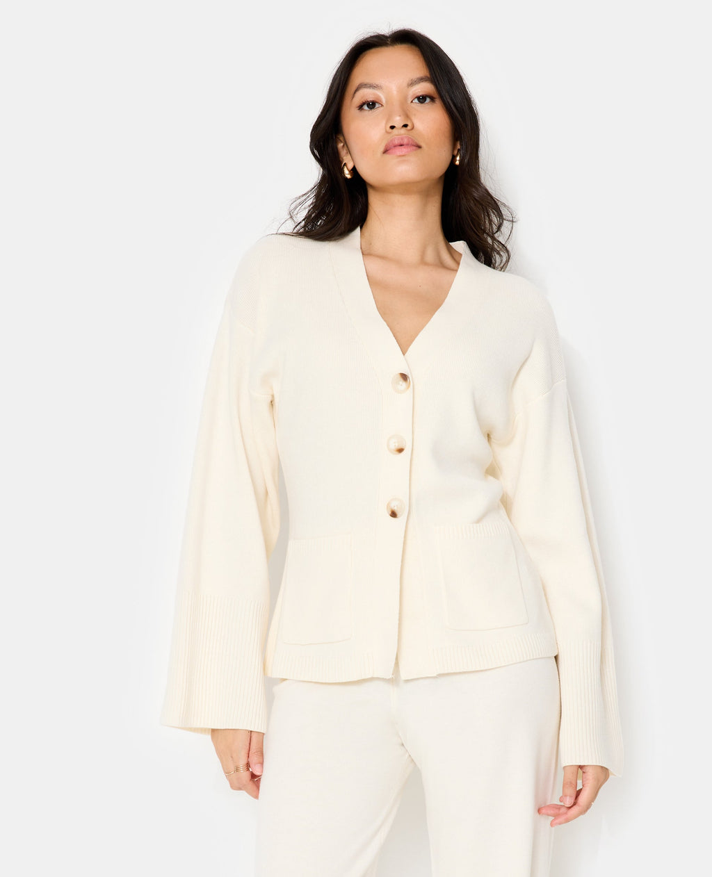 Gilet long et cintré avec poches
