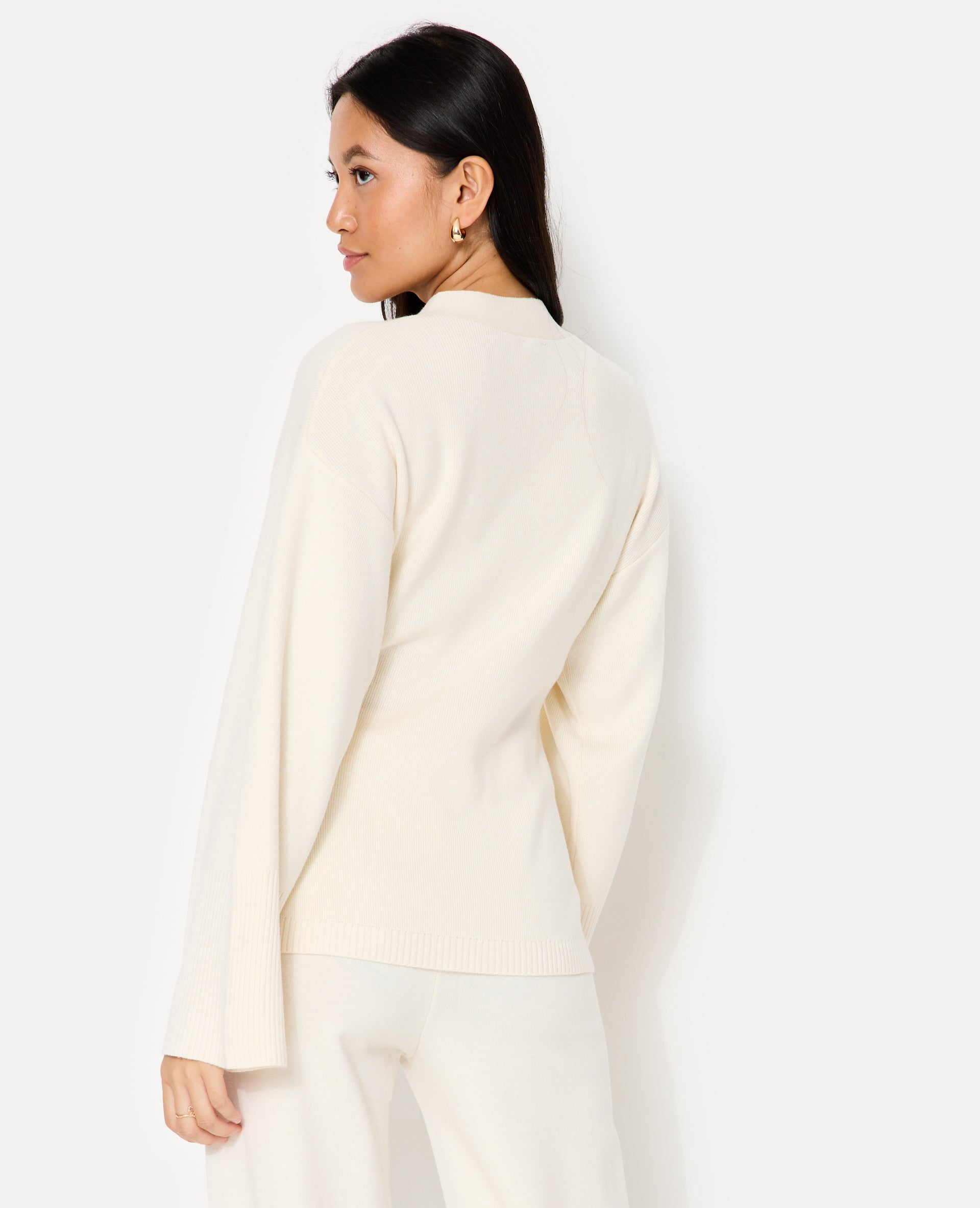 Gilet long et cintré avec poches