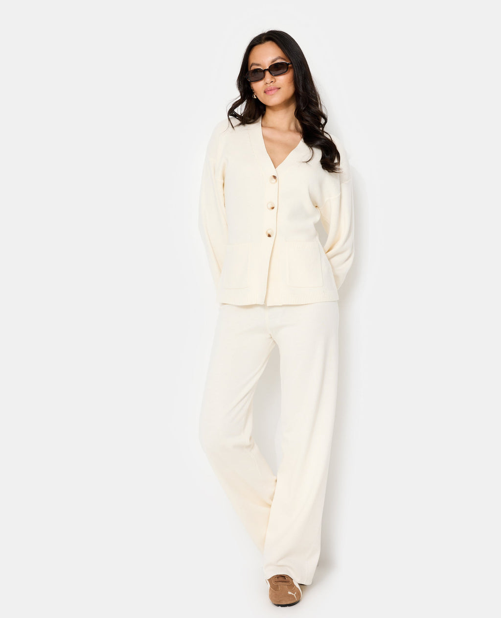 Gilet long et cintré avec poches
