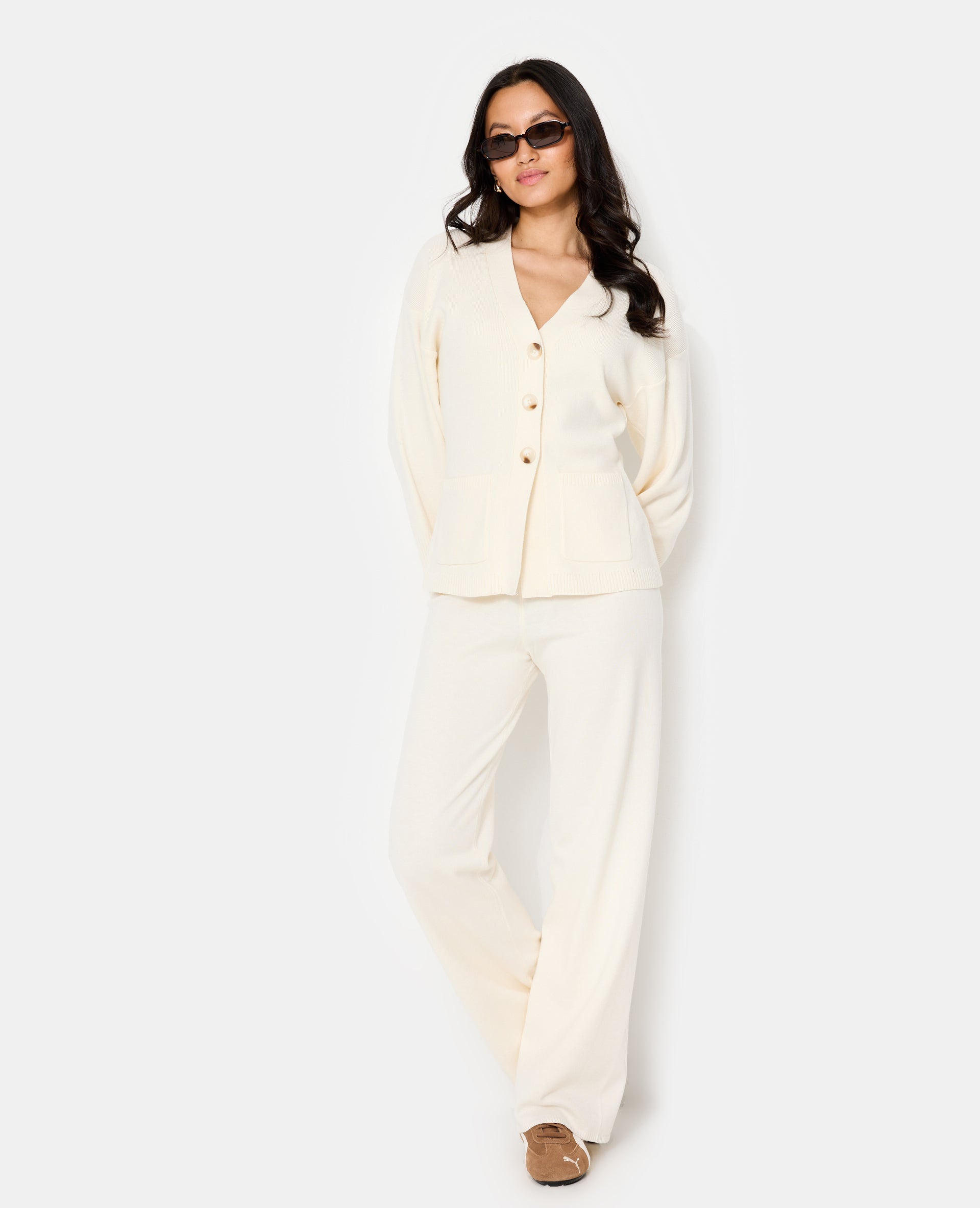 Gilet long et cintré avec poches