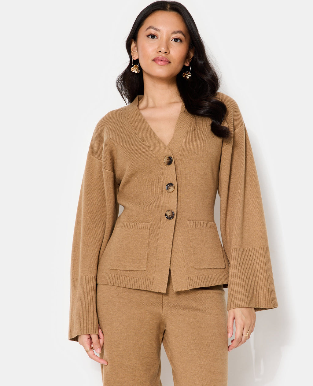 Gilet long et cintré avec poches