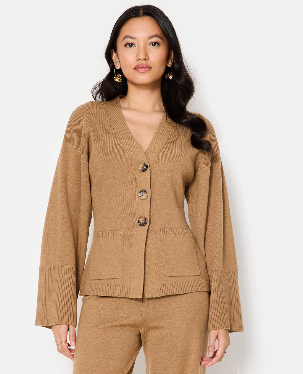 Gilet long et cintré avec poches