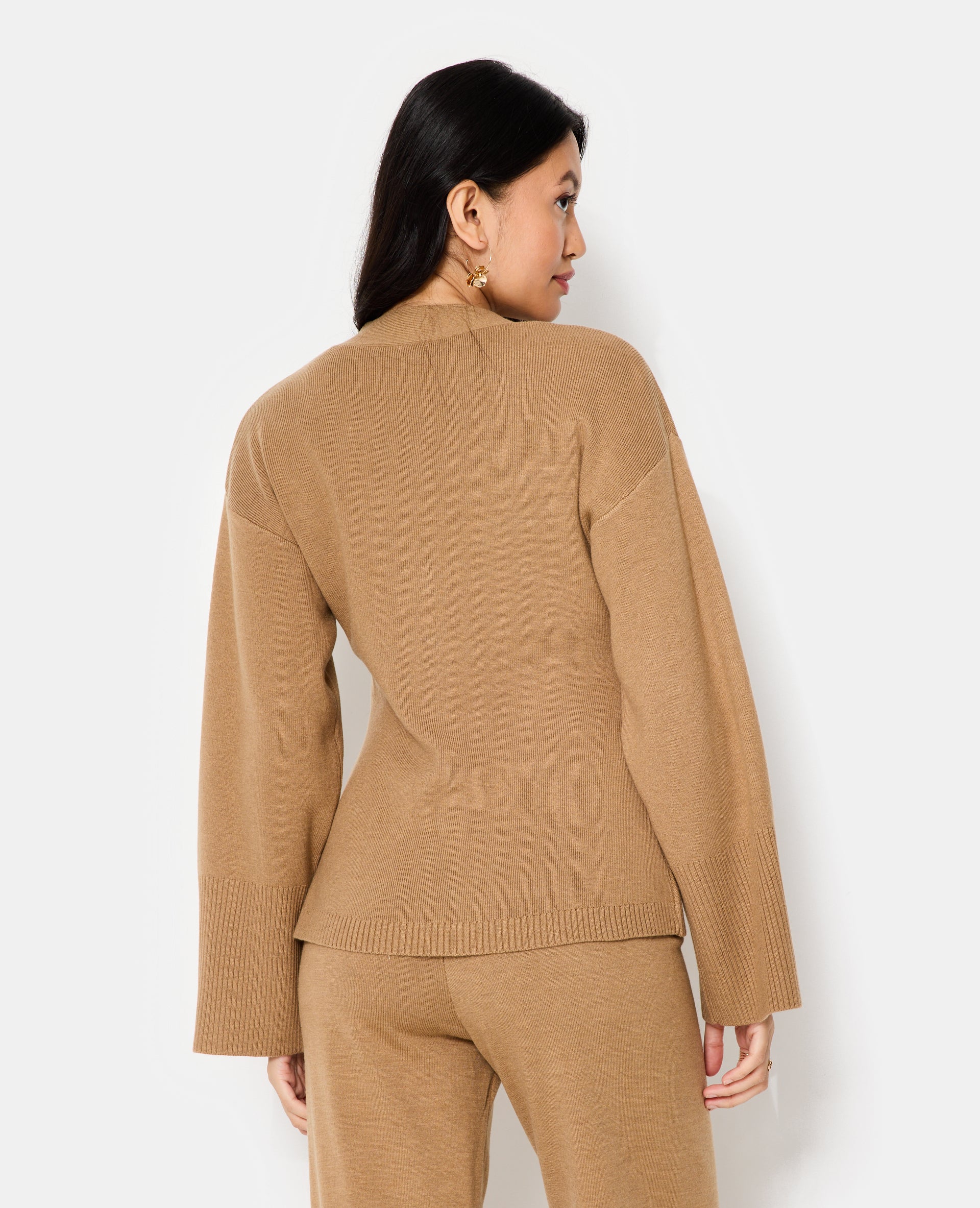 Gilet long et cintré avec poches