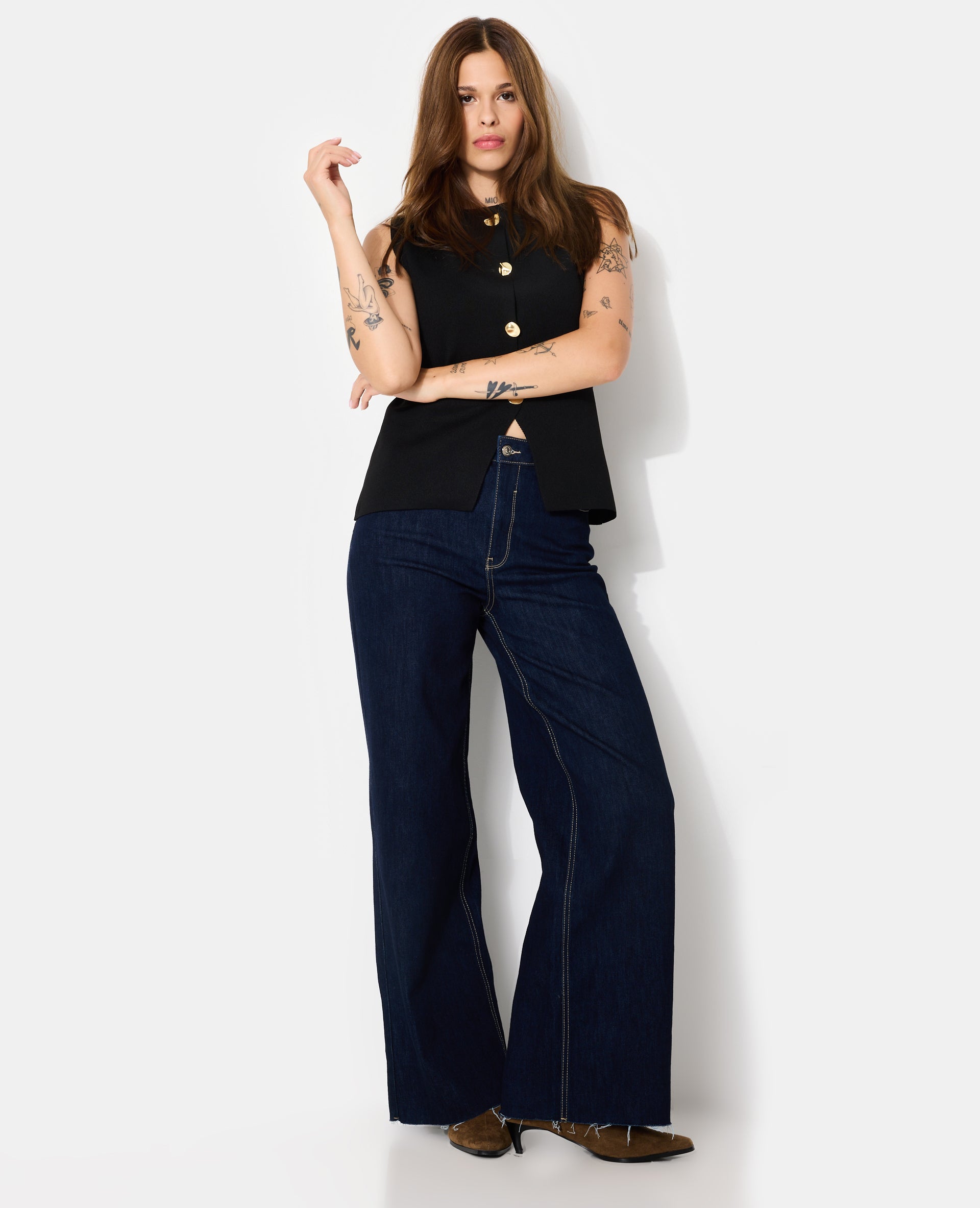 Gilet sans manches avec boutons fantaisie
