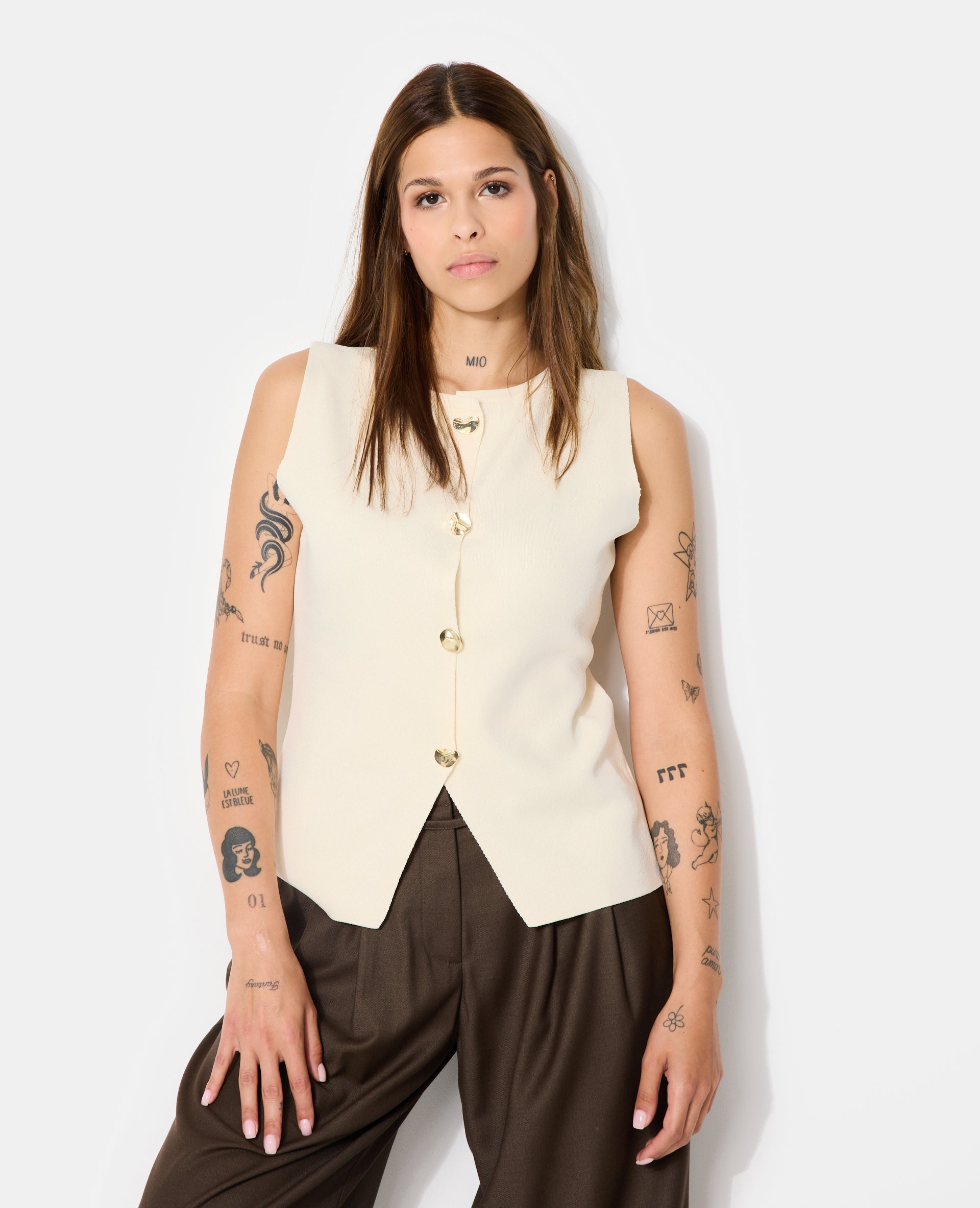 Gilet sans manches avec boutons fantaisie