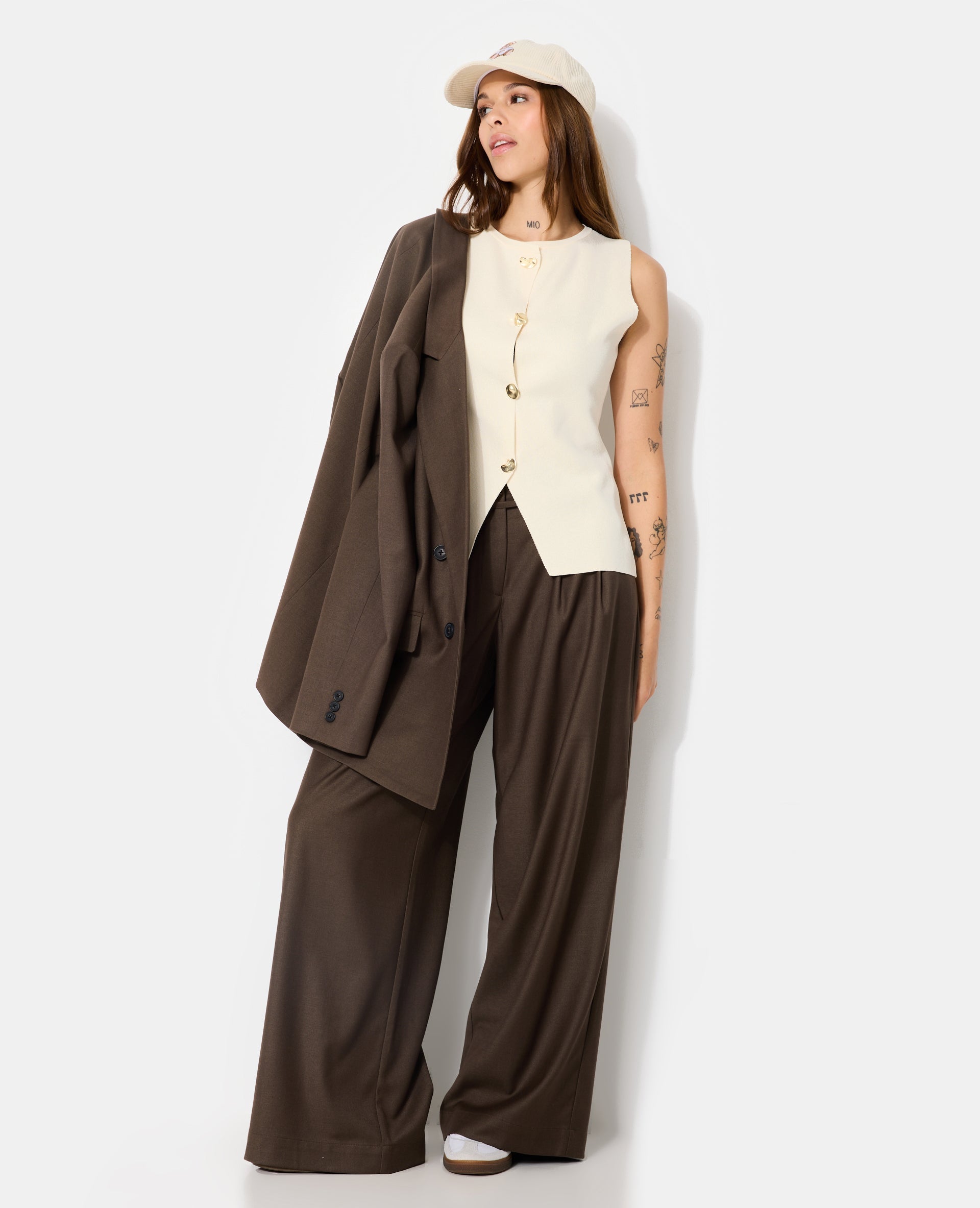 Gilet sans manches avec boutons fantaisie