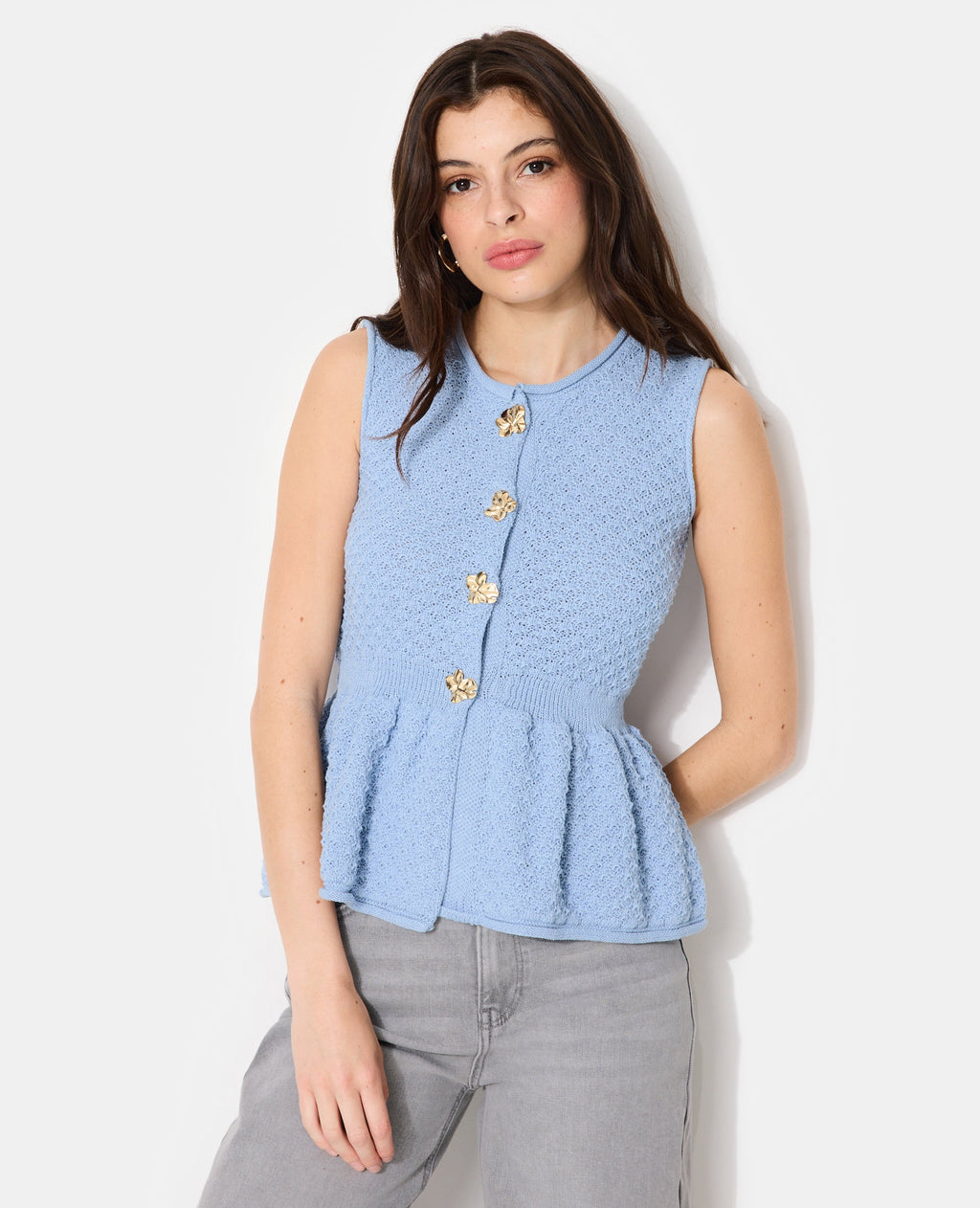 Gilet sans manches peplum avec boutons fantaisie