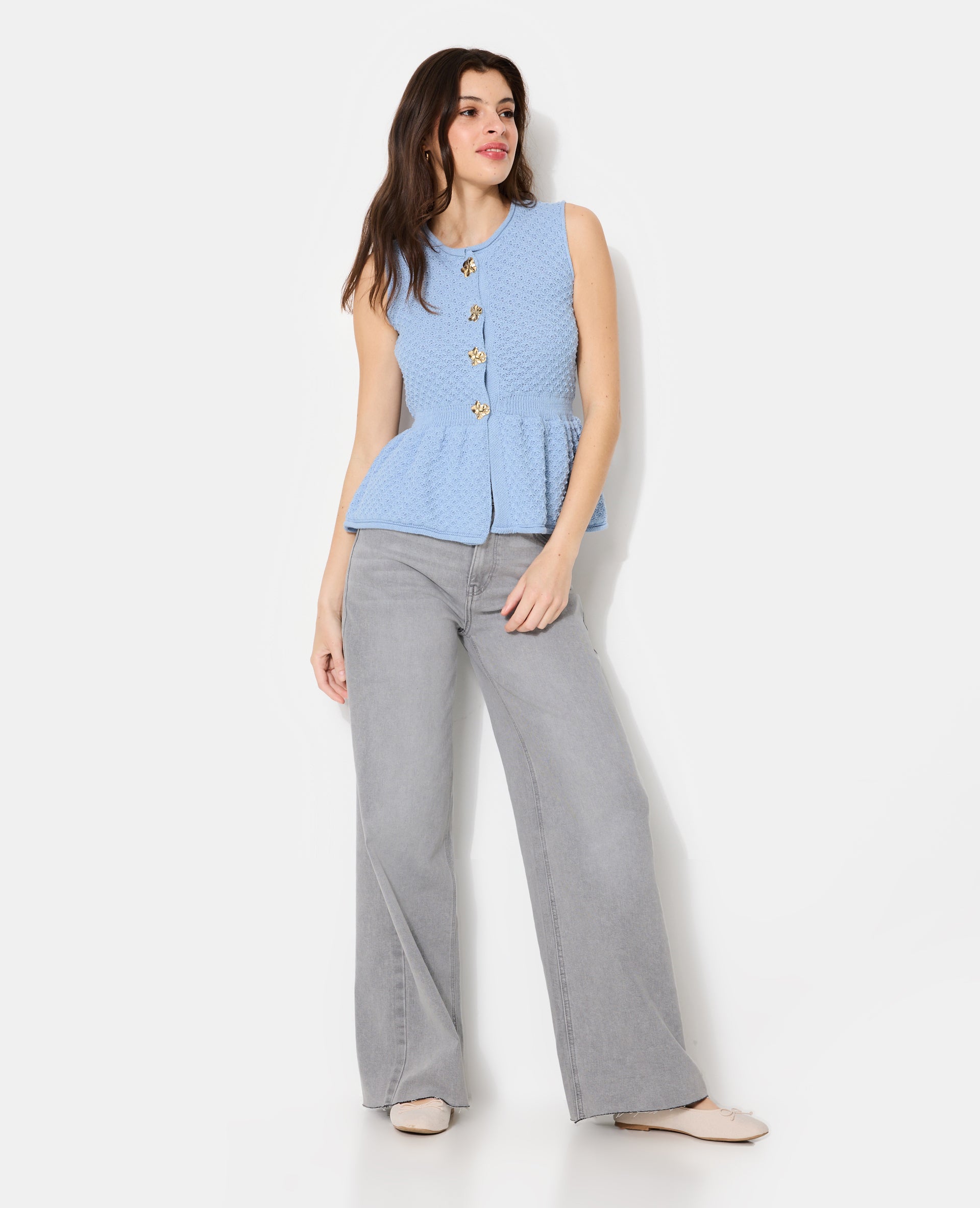 Gilet sans manches peplum avec boutons fantaisie