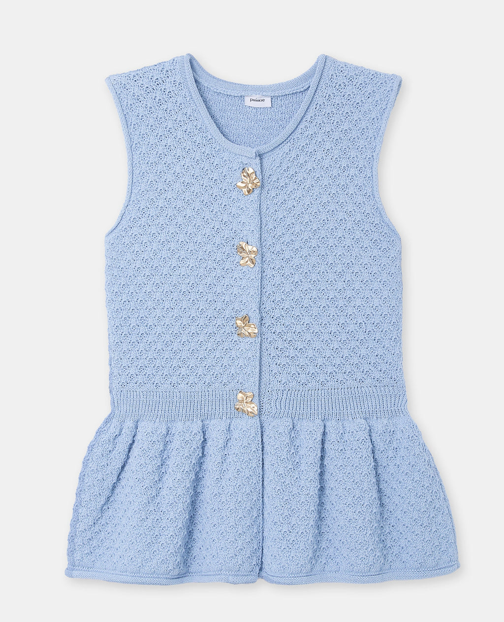 Gilet sans manches peplum avec boutons fantaisie