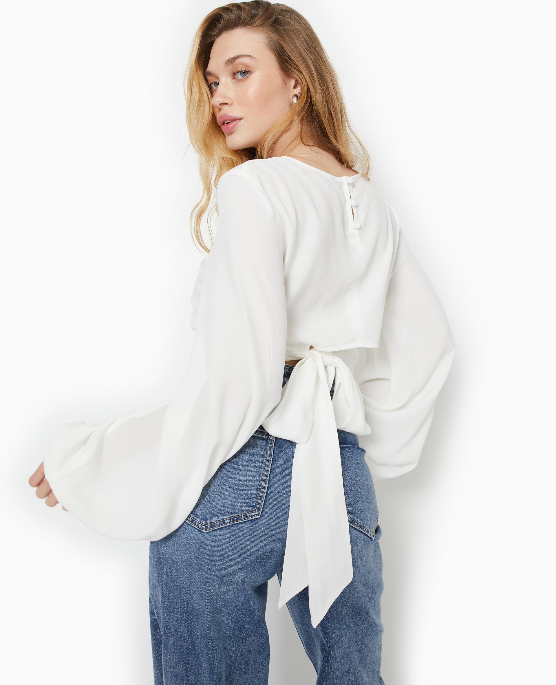 Blouse avec découpe dos et nœud