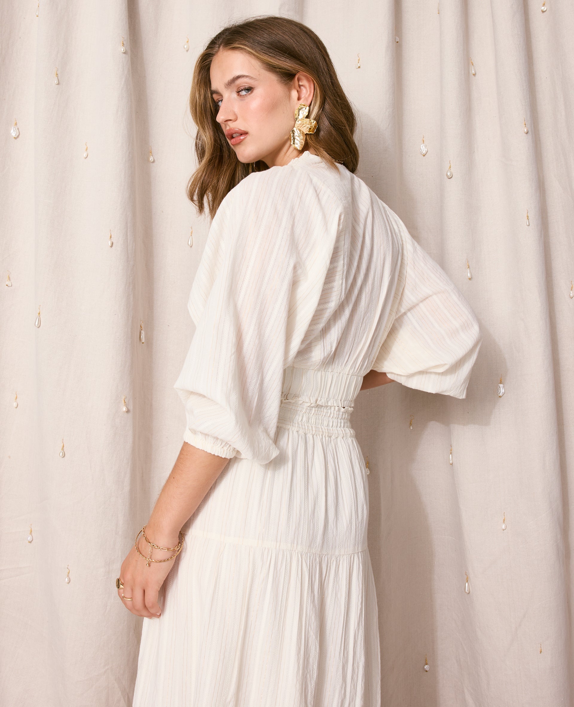 Blouse décolletée avec manches chauve-souris
