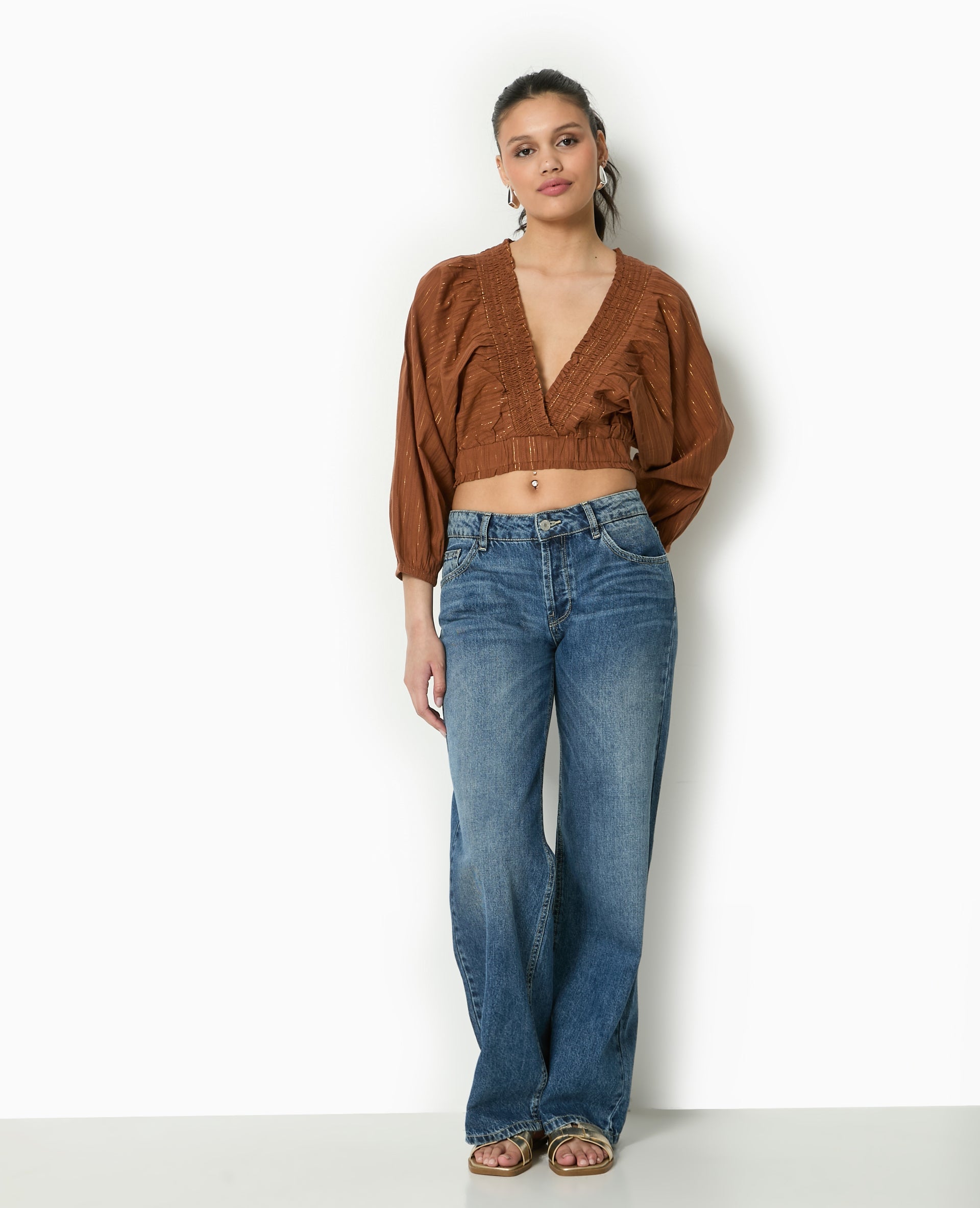 Blouse décolletée avec manches chauve-souris