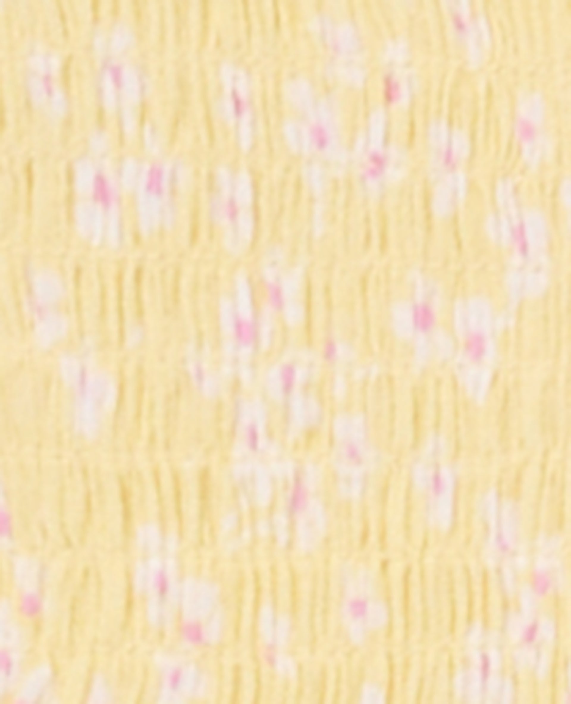 Top court forme empire avec petites fleurs