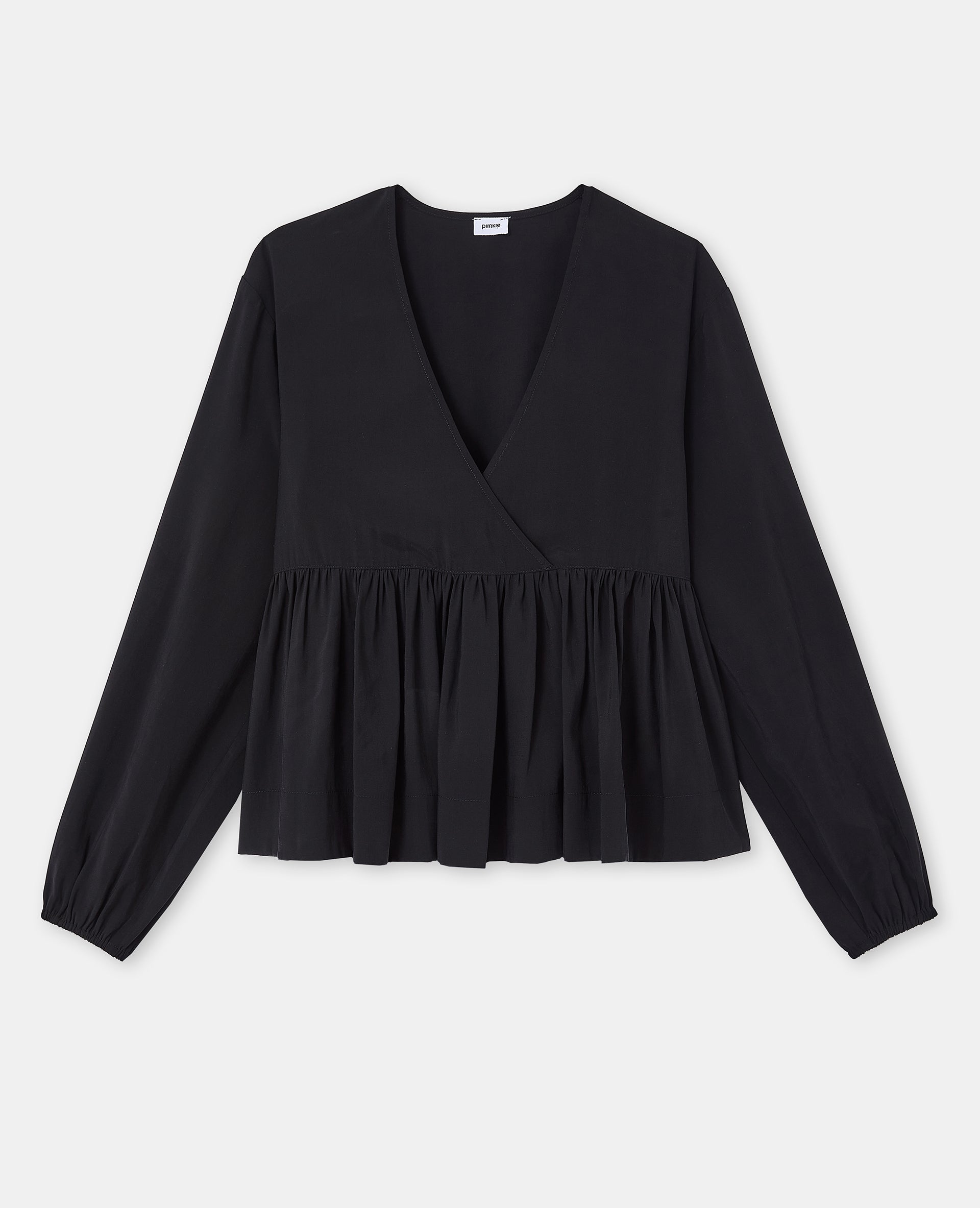 Blouse cache-coeur en tissu effet peau de pêche