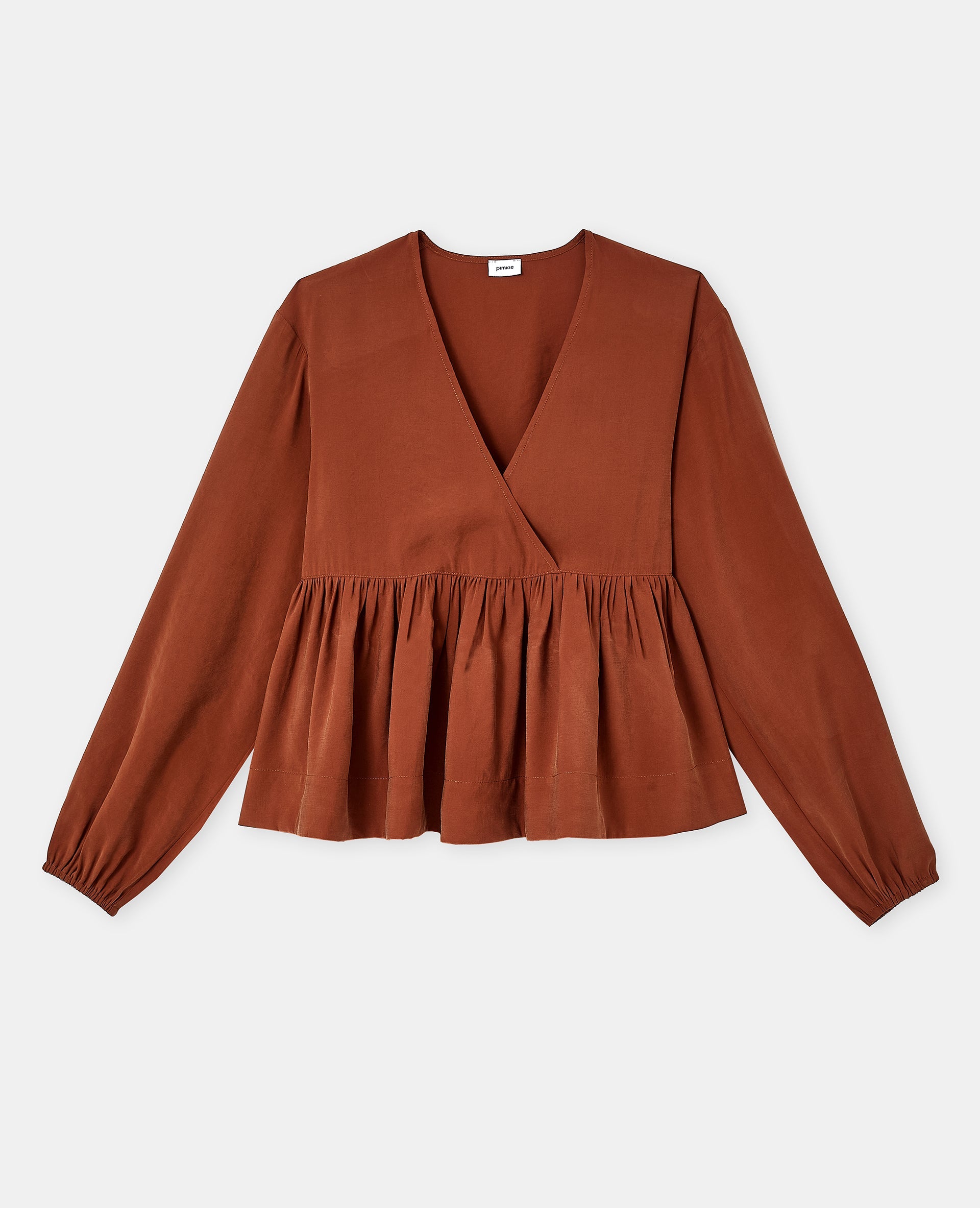 Blouse cache-coeur en tissu effet peau de pêche