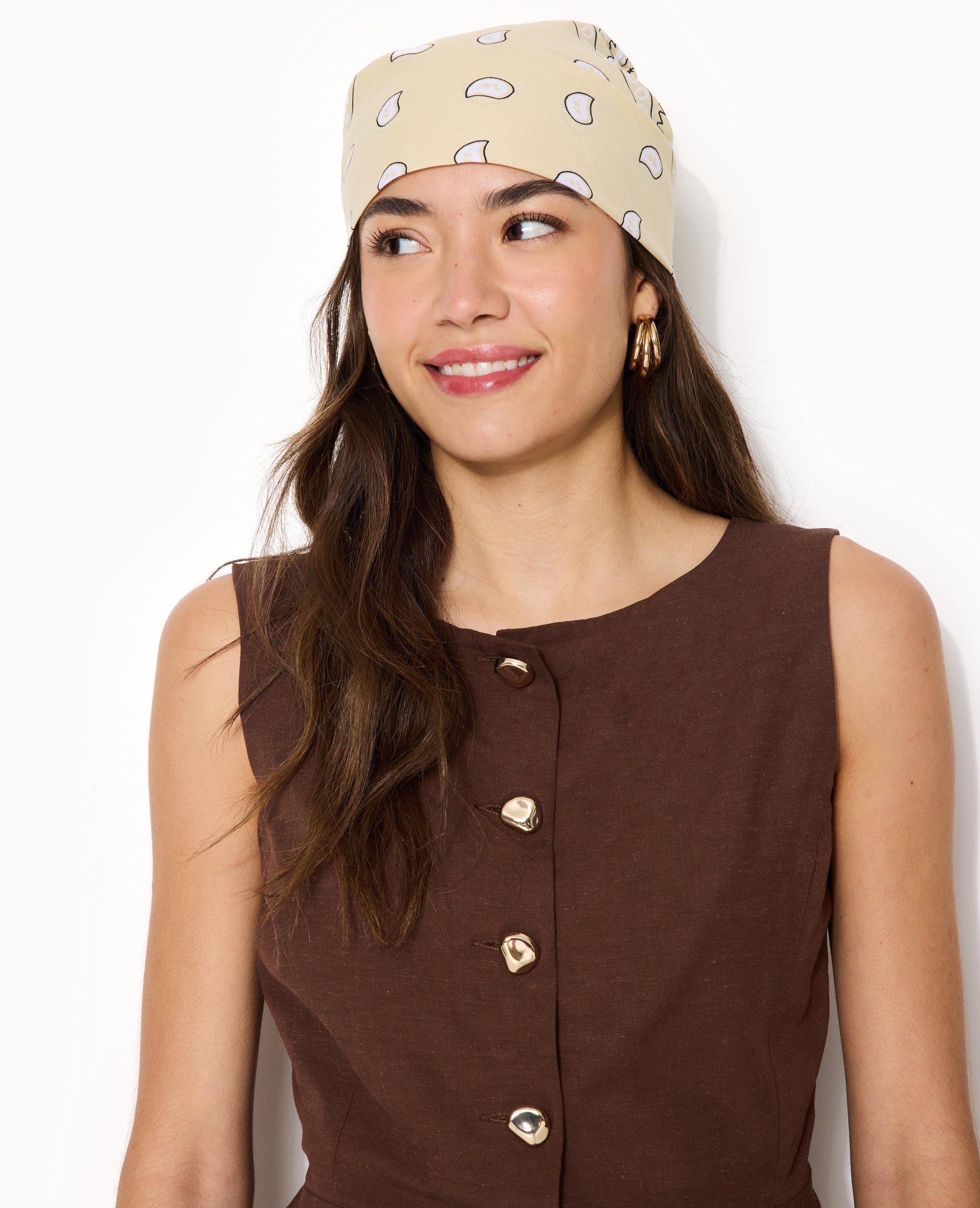 Top sans manches forme peplum avec dos dégagé