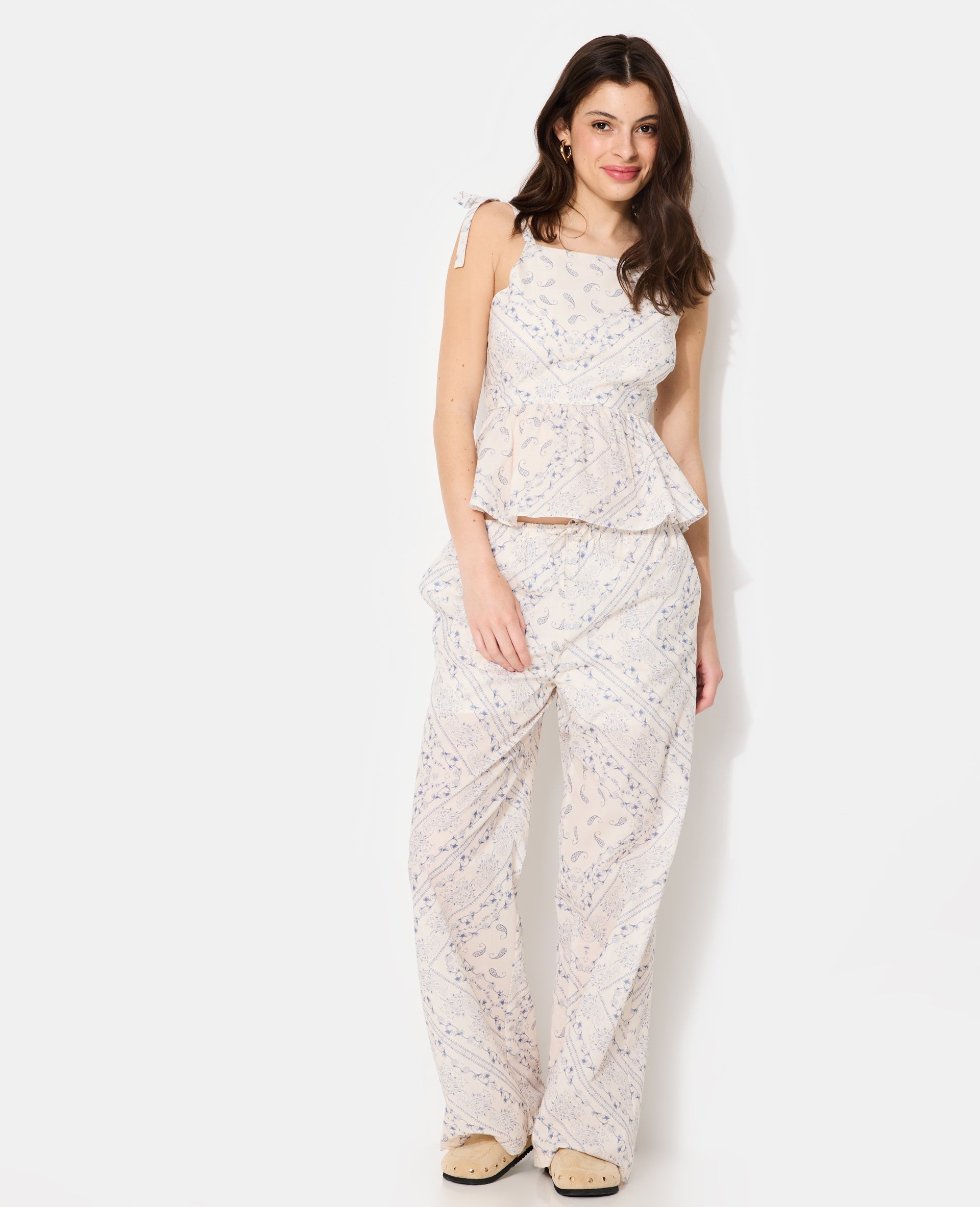 Top peplum motif fleurs et bandana