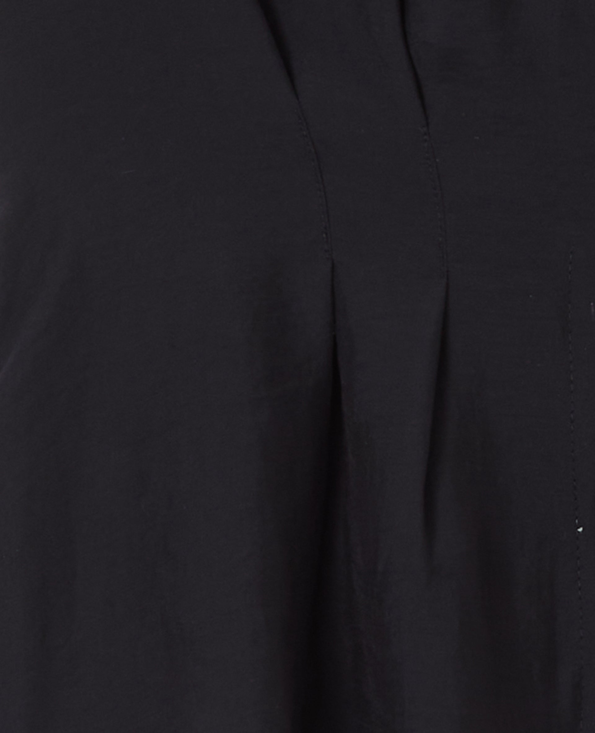 Top boutonné sans manches avec pinces