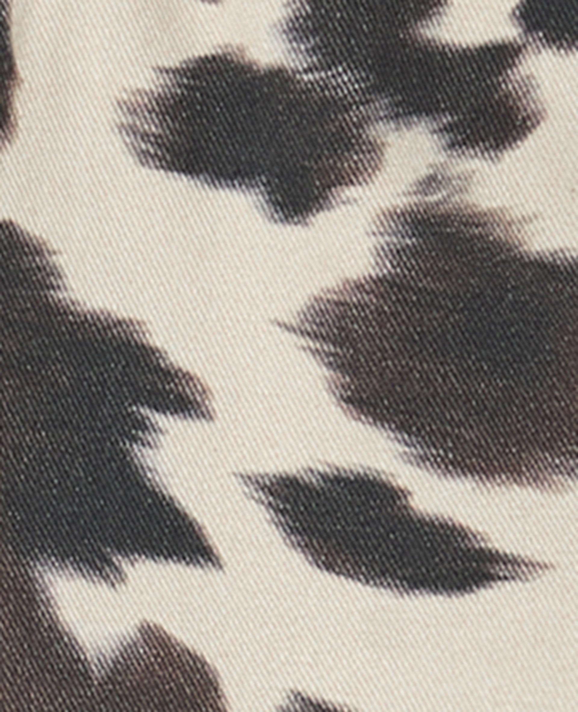 Mini-jupe en toile motif vache