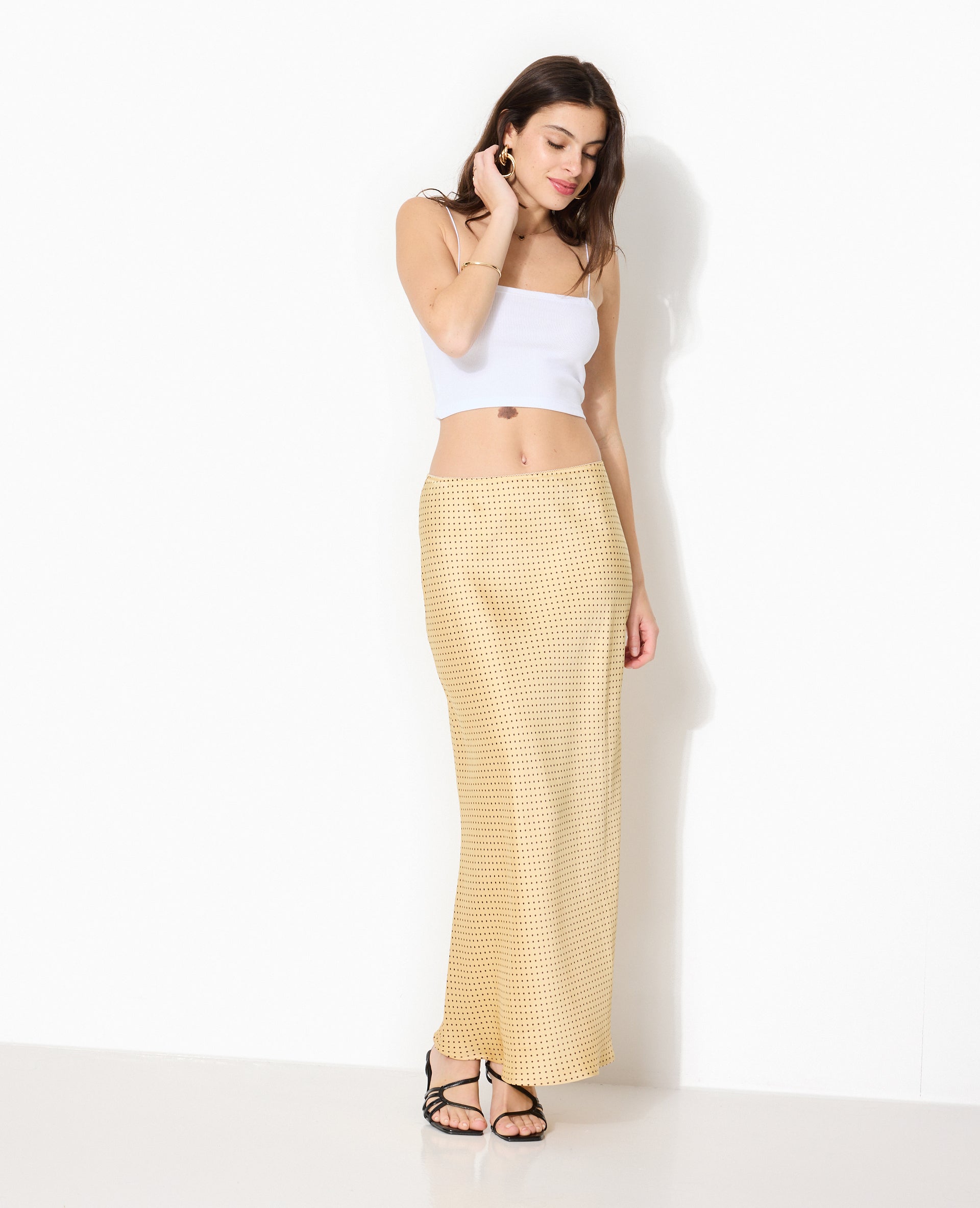 Jupe longue en satin motif pois