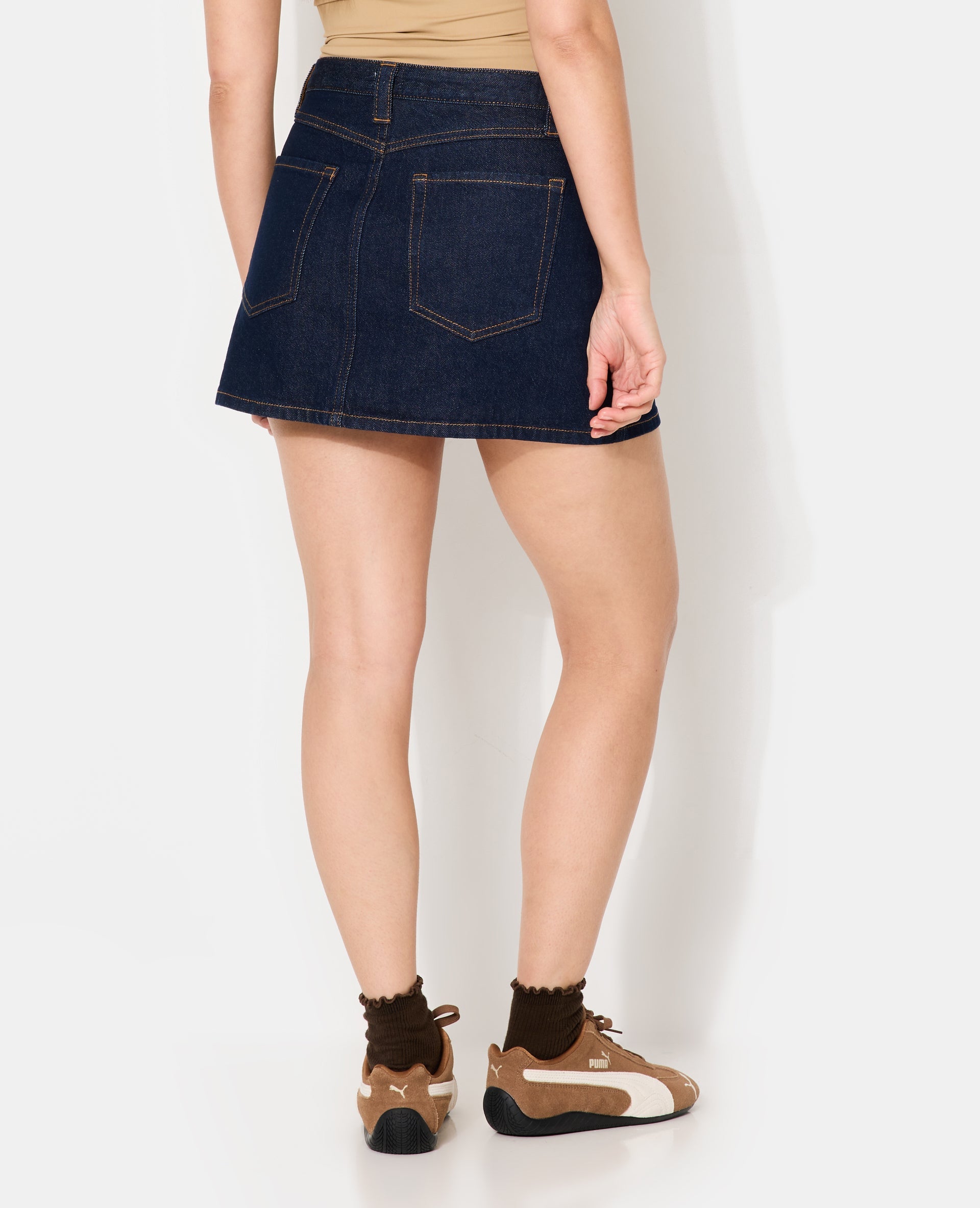 Mini jupe-short taille basse en jean
