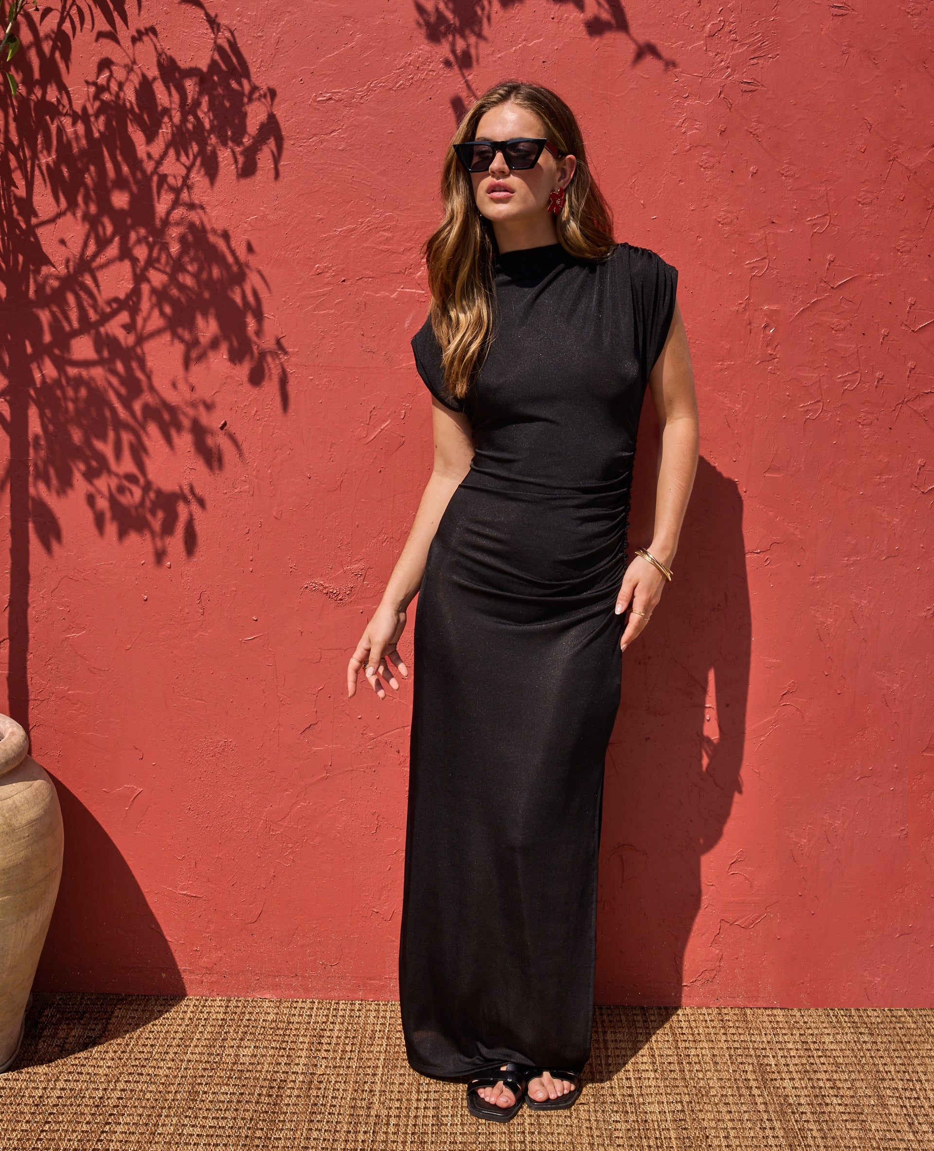 Robe longue en maille avec fronces et drapés