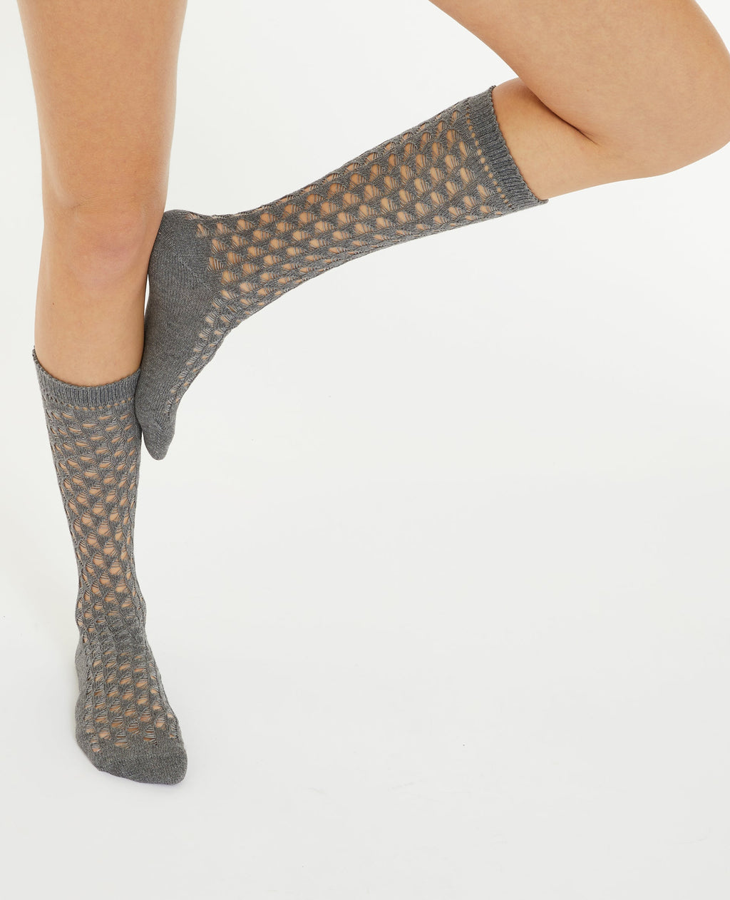 Paire de chaussettes hautes en maille ajourée