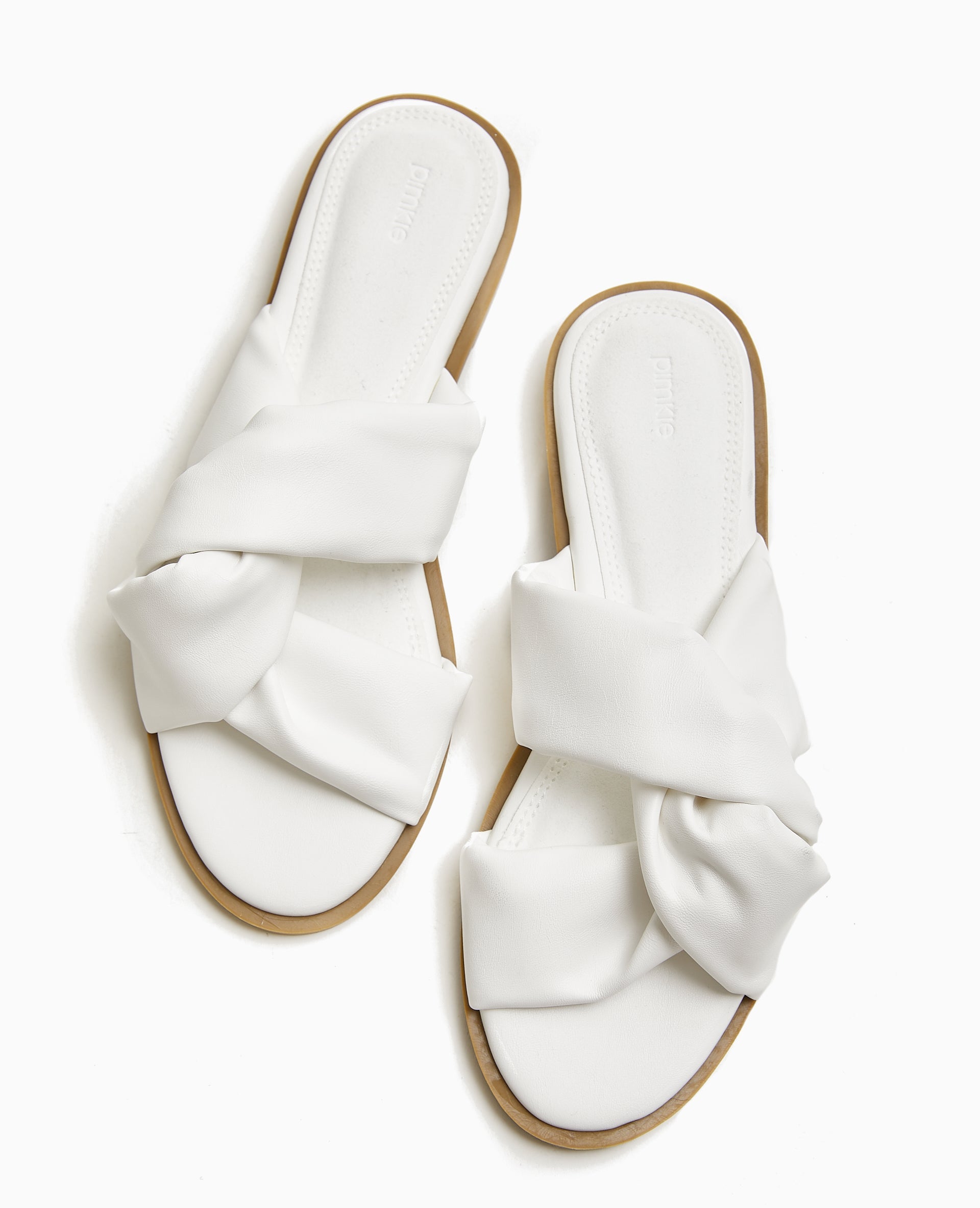 Mules plates avec brides entremêlées