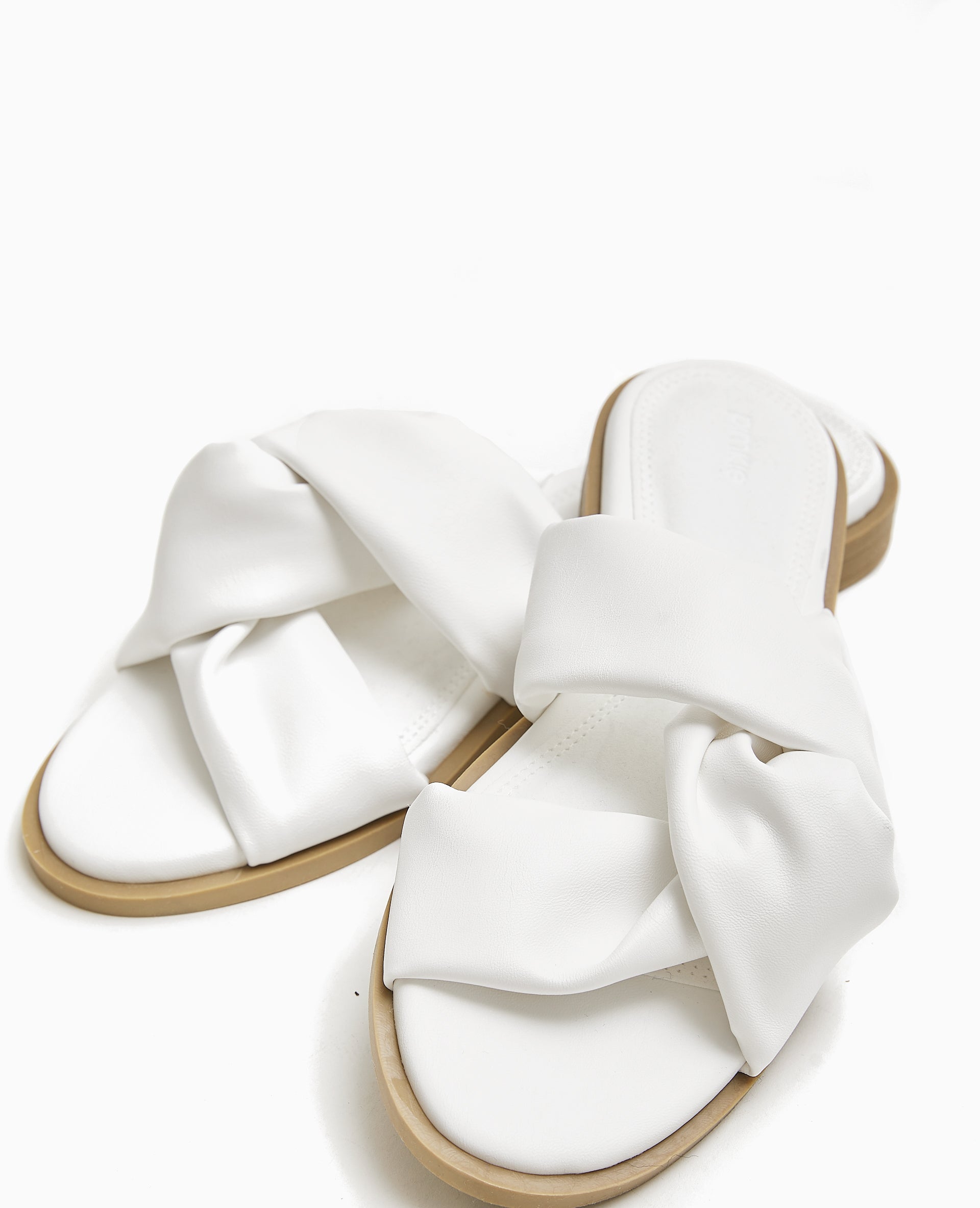 Mules plates avec brides entremêlées