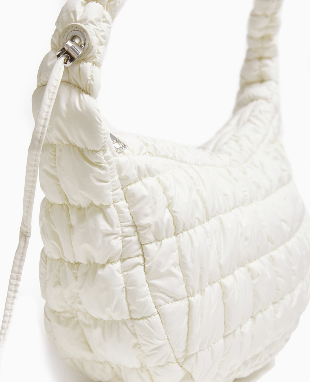 Sac besace en tissu matelassé