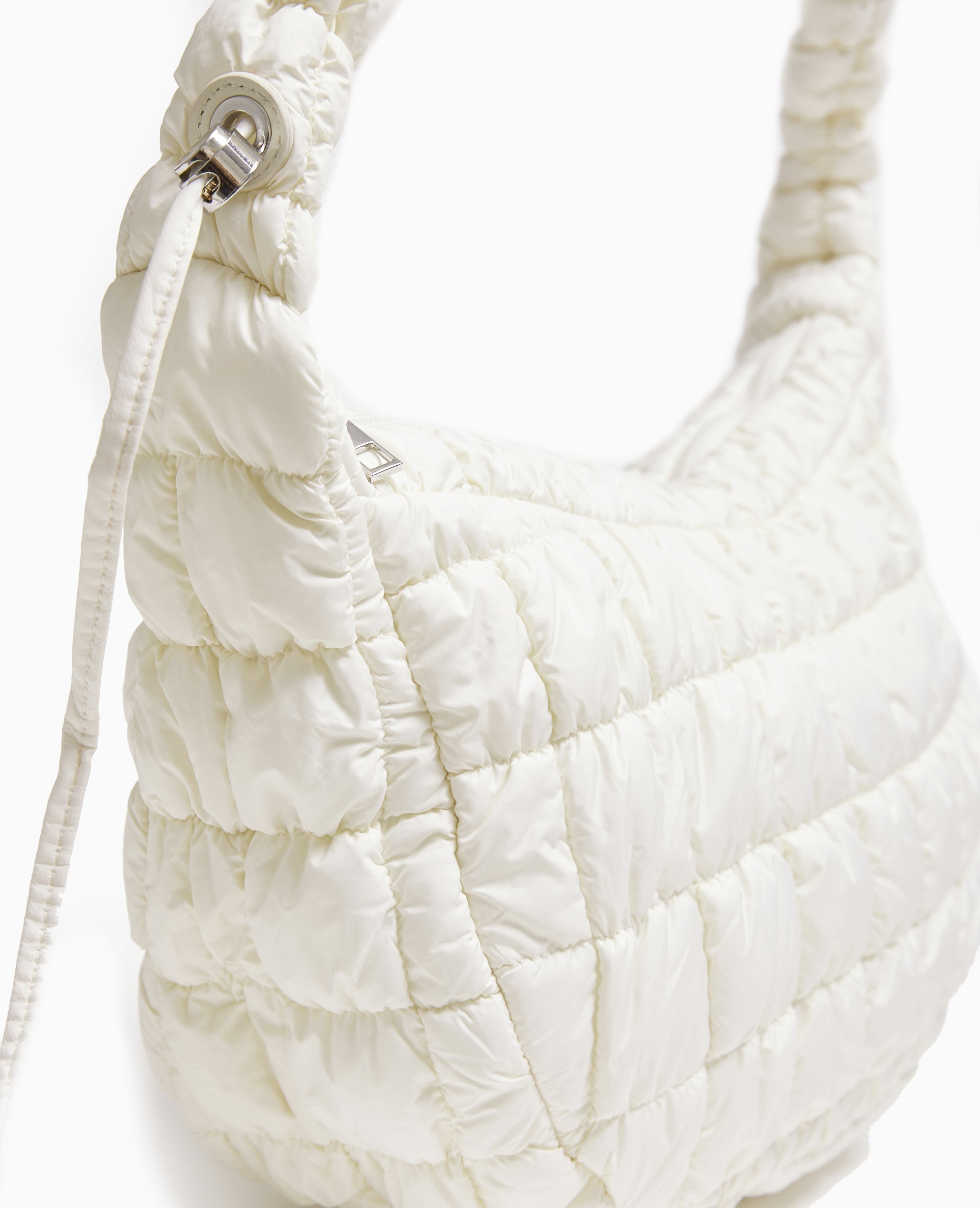 Sac besace en tissu matelassé