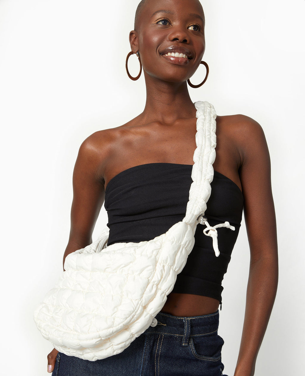 Sac besace en tissu matelassé