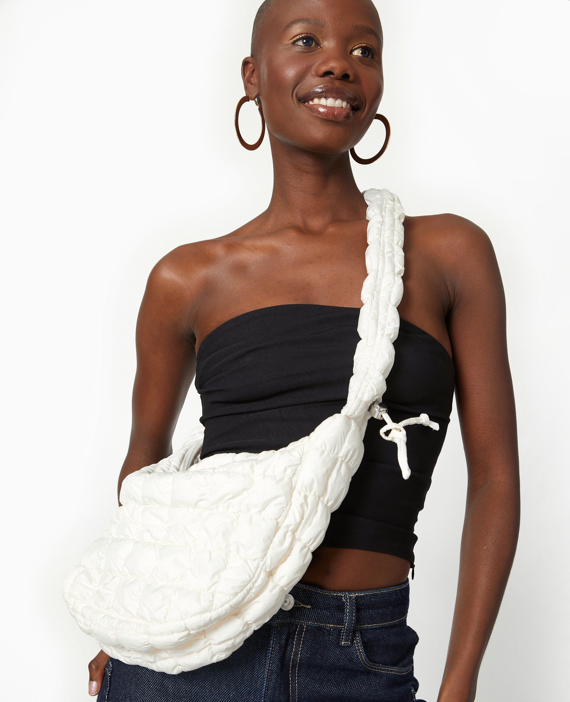Sac besace en tissu matelassé