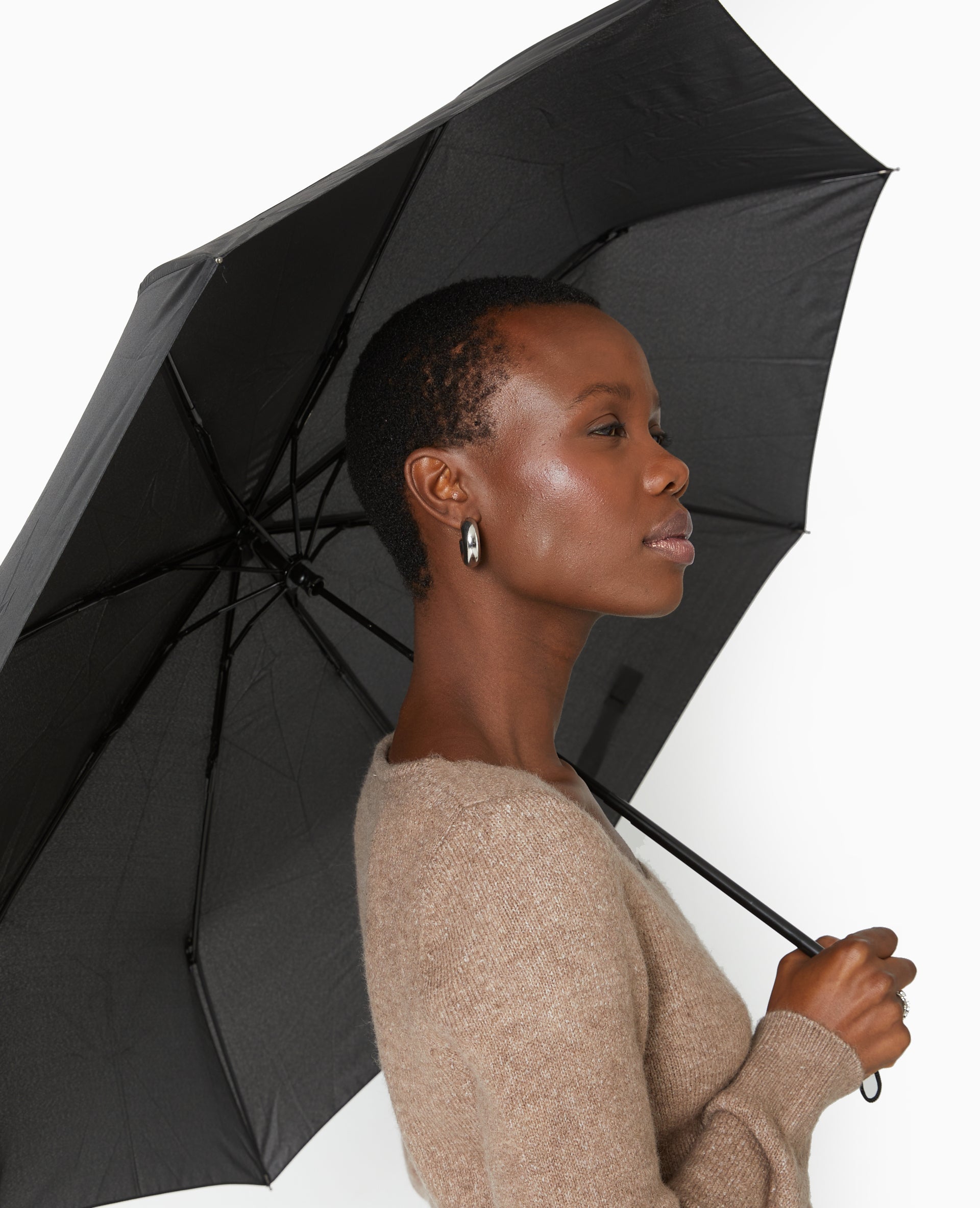 Parapluie rétractable avec housse