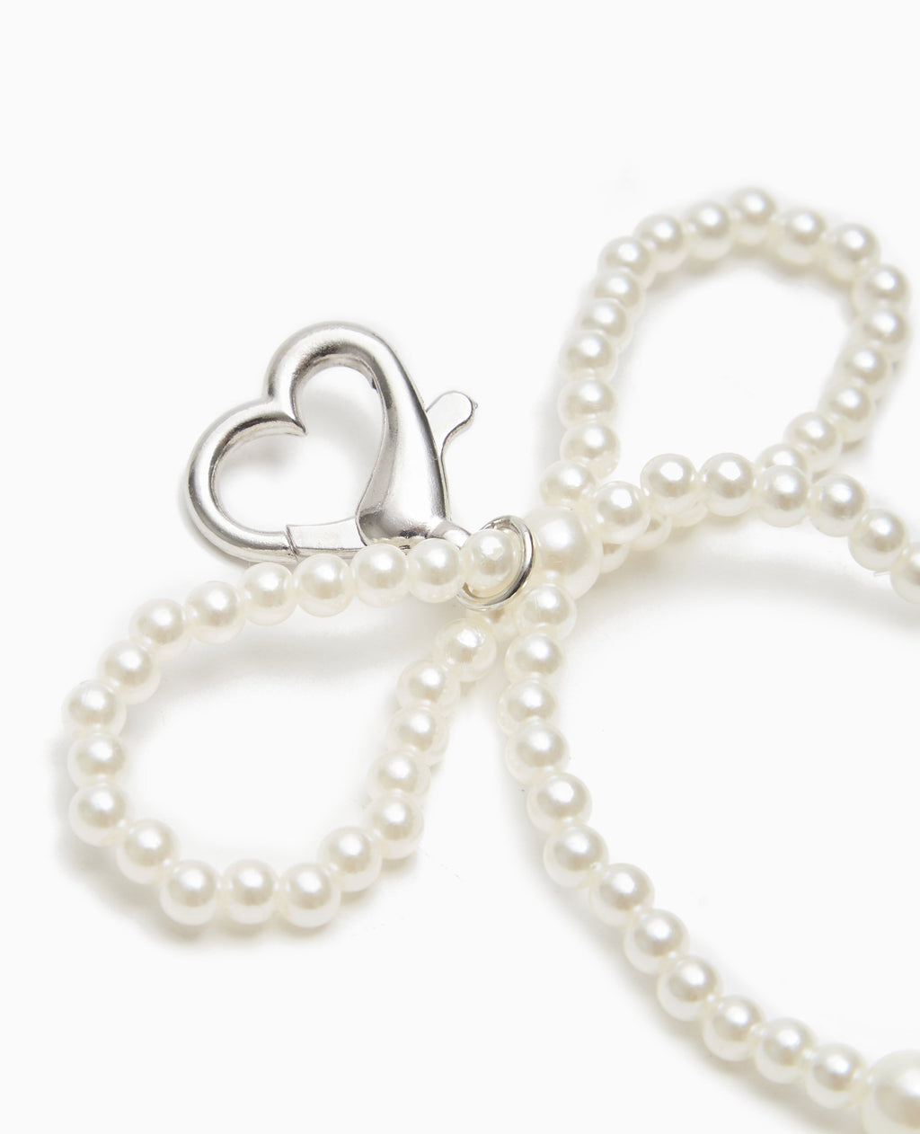 Bijou de sac avec nœud en perles