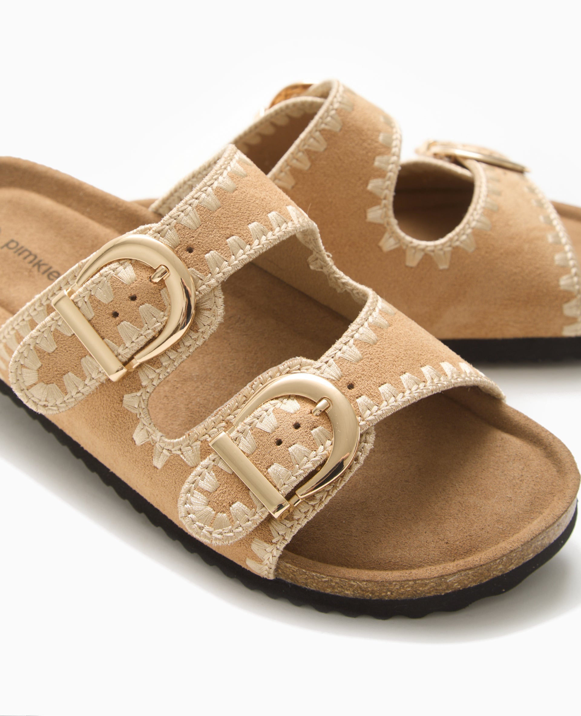 Mules à brides avec détails coutures