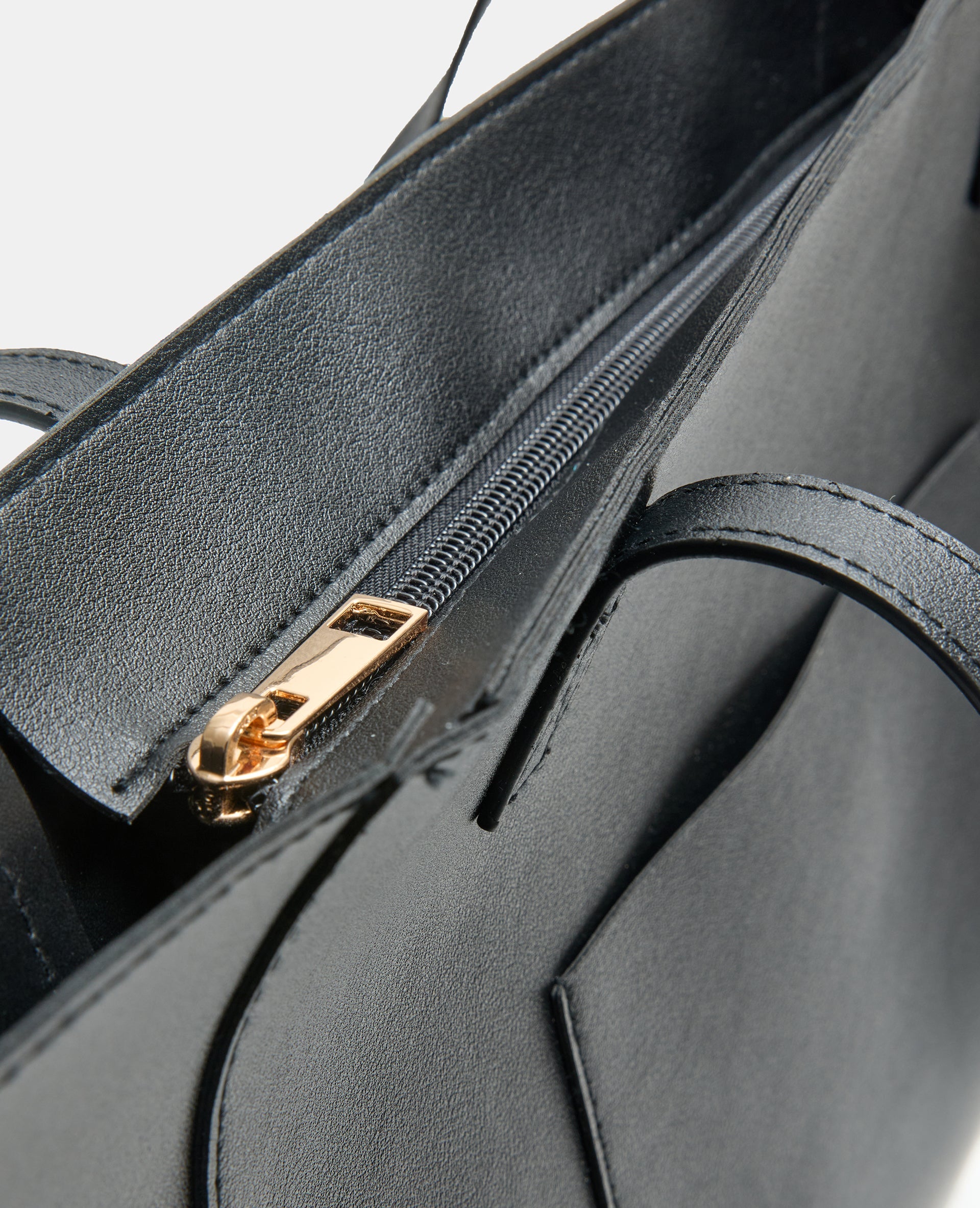 Grand sac en simili avec poche et poignées