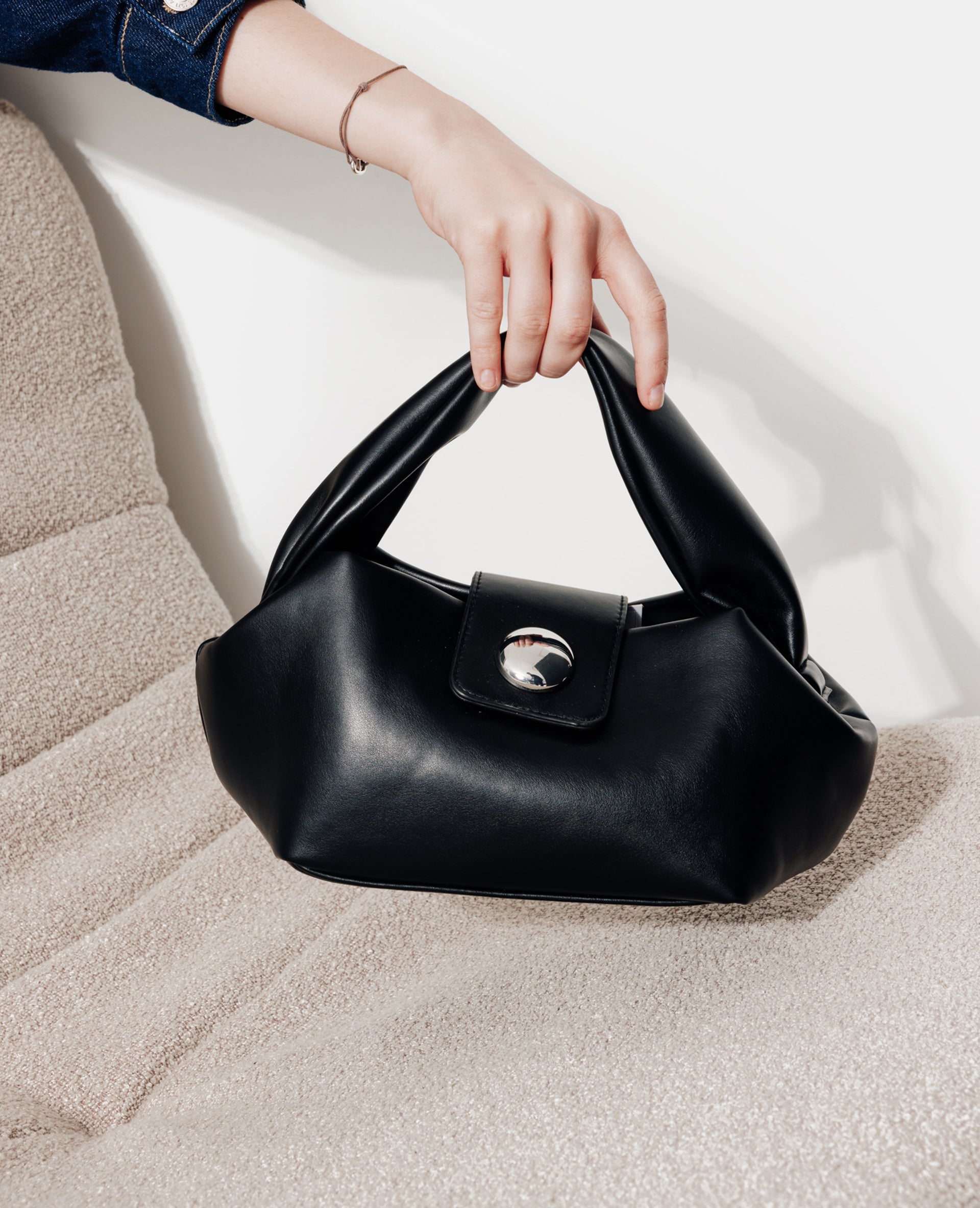 Sac avec grosse pression, poignée et bandoulière