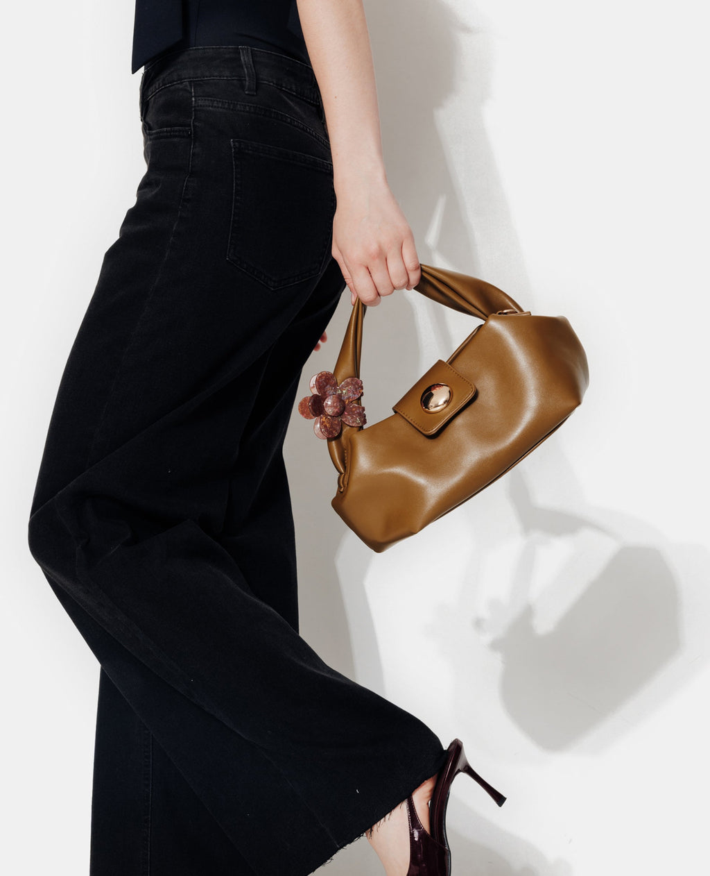 Sac avec grosse pression, poignée et bandoulière