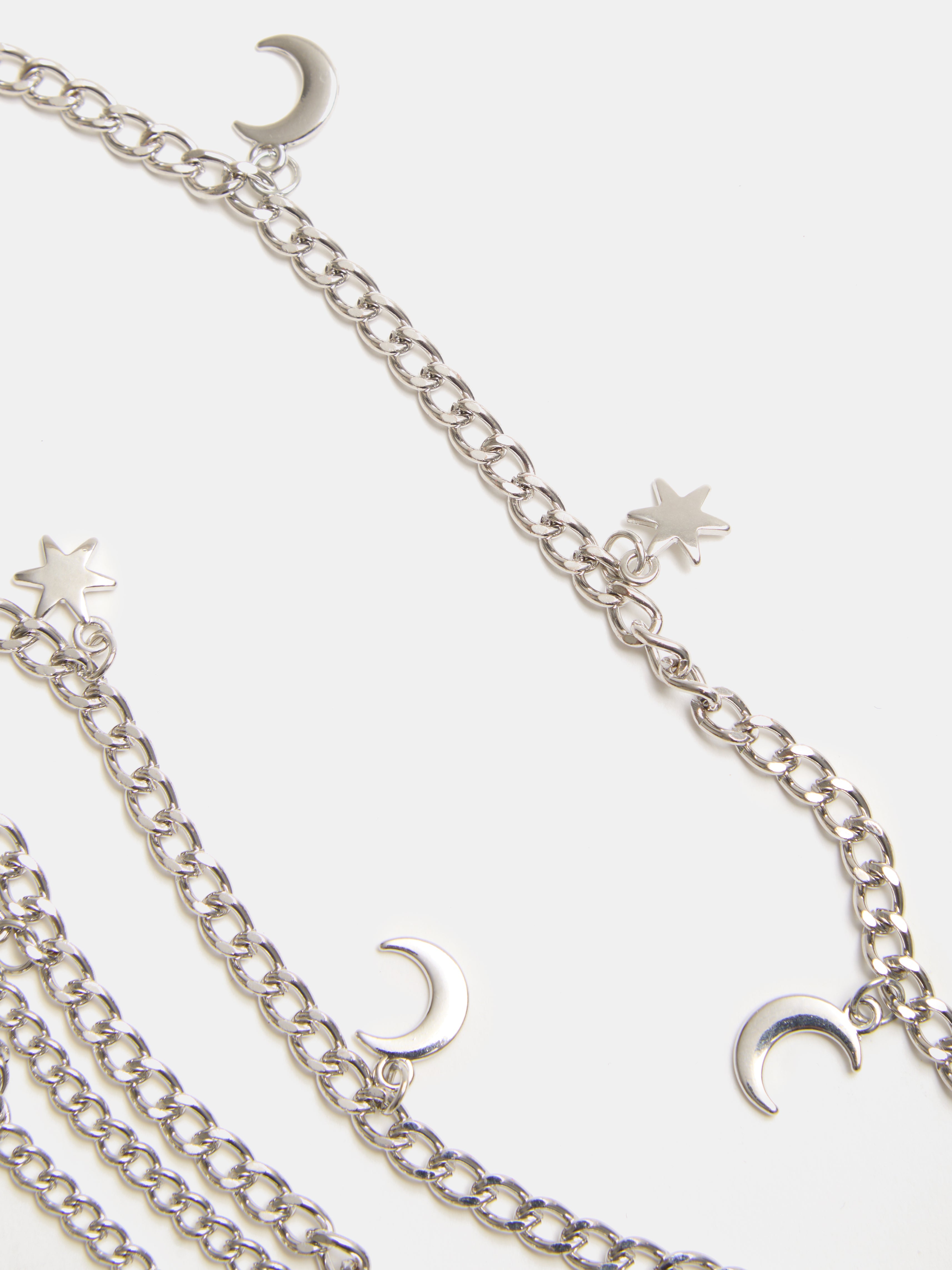 Ceinture chaîne double rangée avec étoiles et lunes